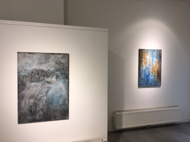 Abstract textured painting in grey and blue