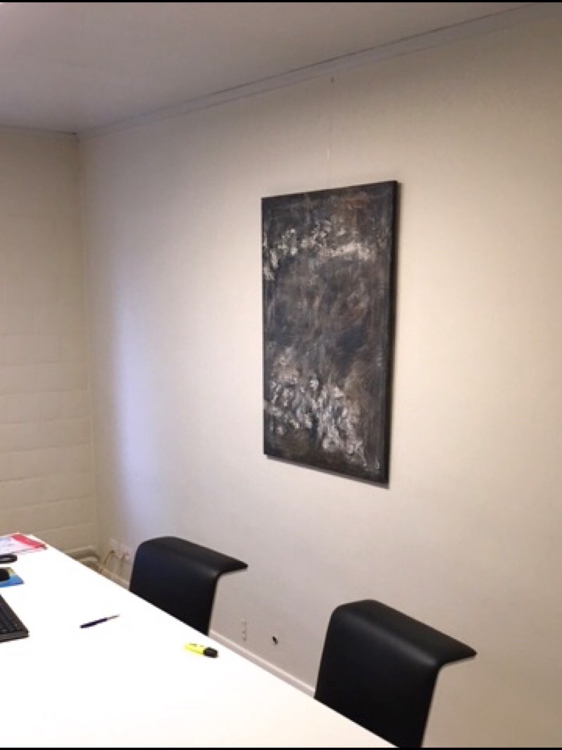 Interior design: Textured abstract painting in dark tones