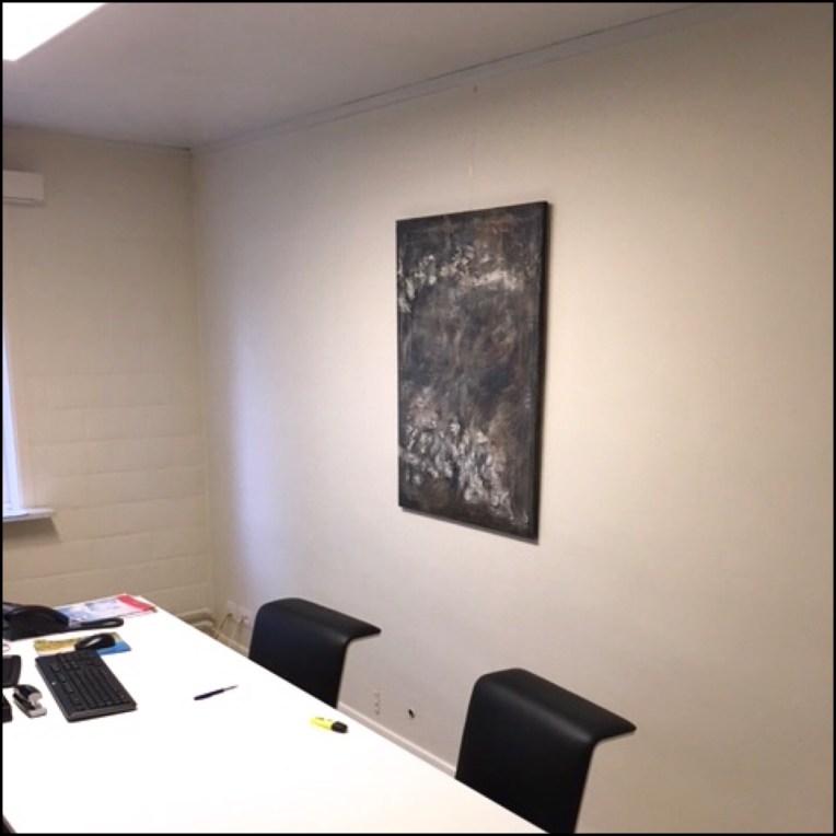 Interior design: Textured abstract painting in dark tones