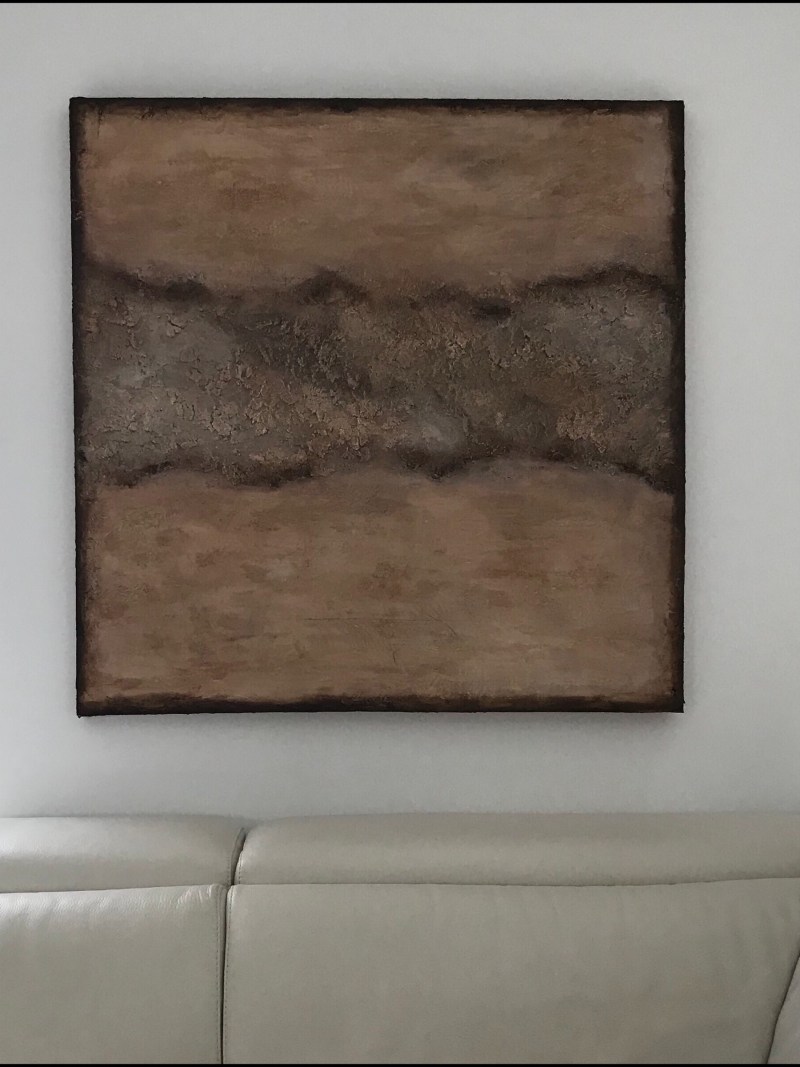 Textured abstract painting in earth tones