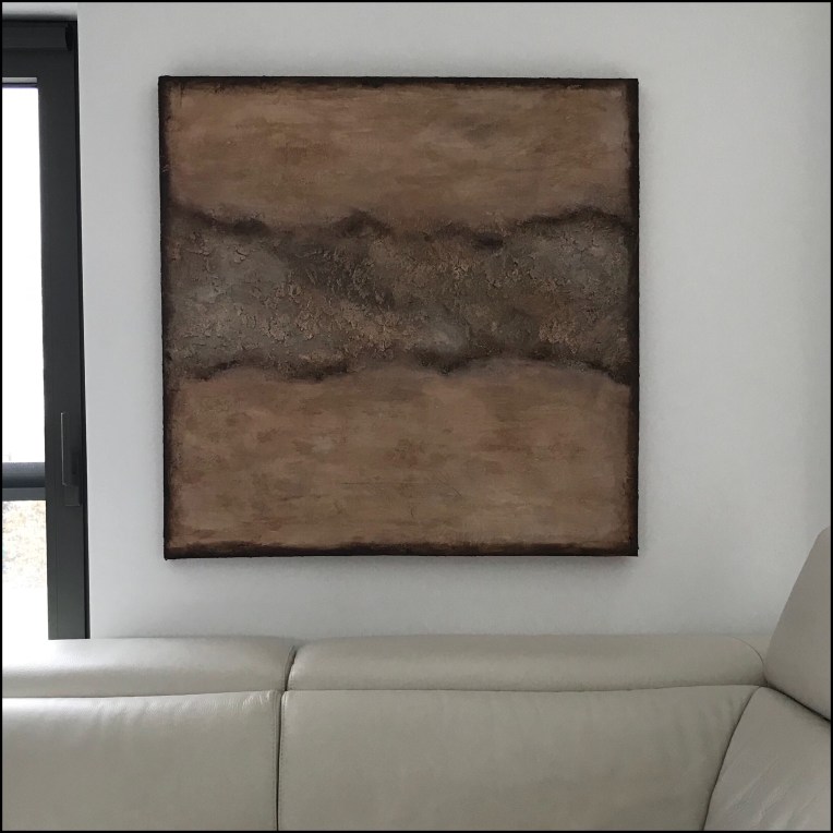 Textured abstract painting in earth tones