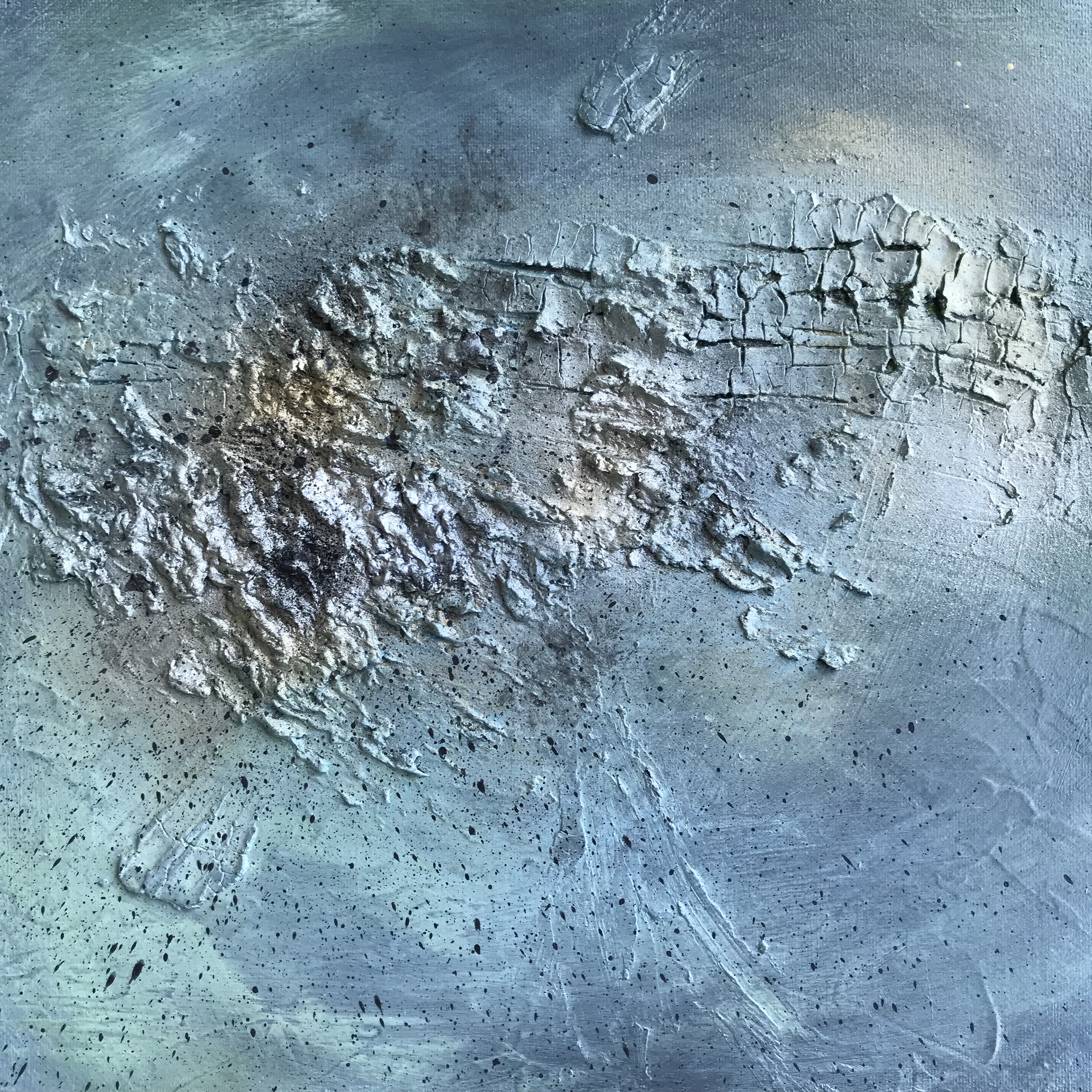 Textured abstract painting in blue and grey